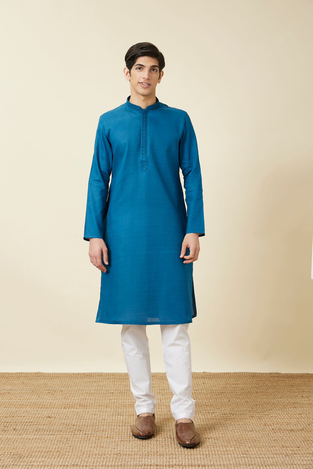 alt message - Manyavar Men Brilliant Blue Embroidered Neckline Kurta Set image number 2