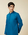 alt message - Manyavar Men Brilliant Blue Embroidered Neckline Kurta Set image number 0