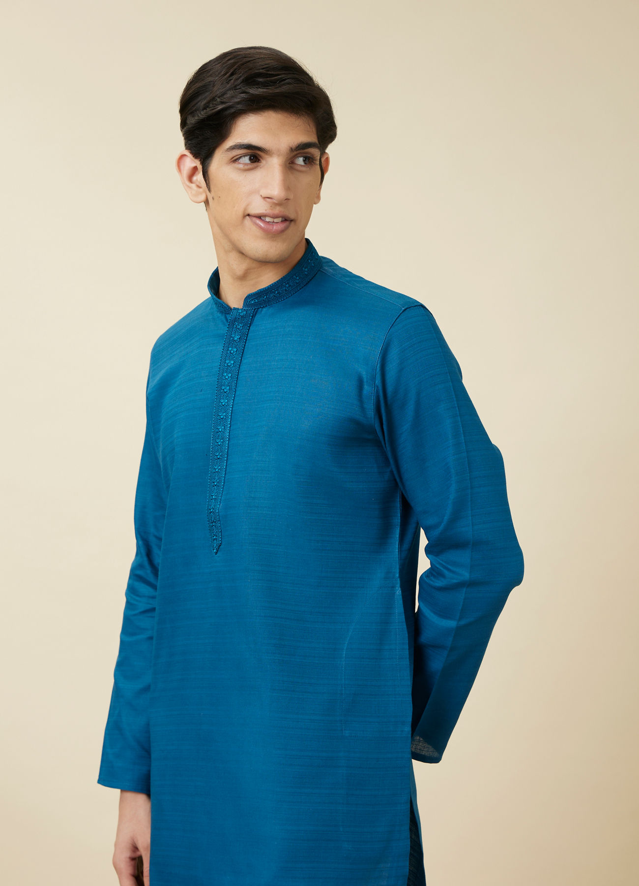 Manyavar Men Brilliant Blue Embroidered Neckline Kurta Set