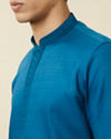 Manyavar Men Brilliant Blue Embroidered Neckline Kurta Set