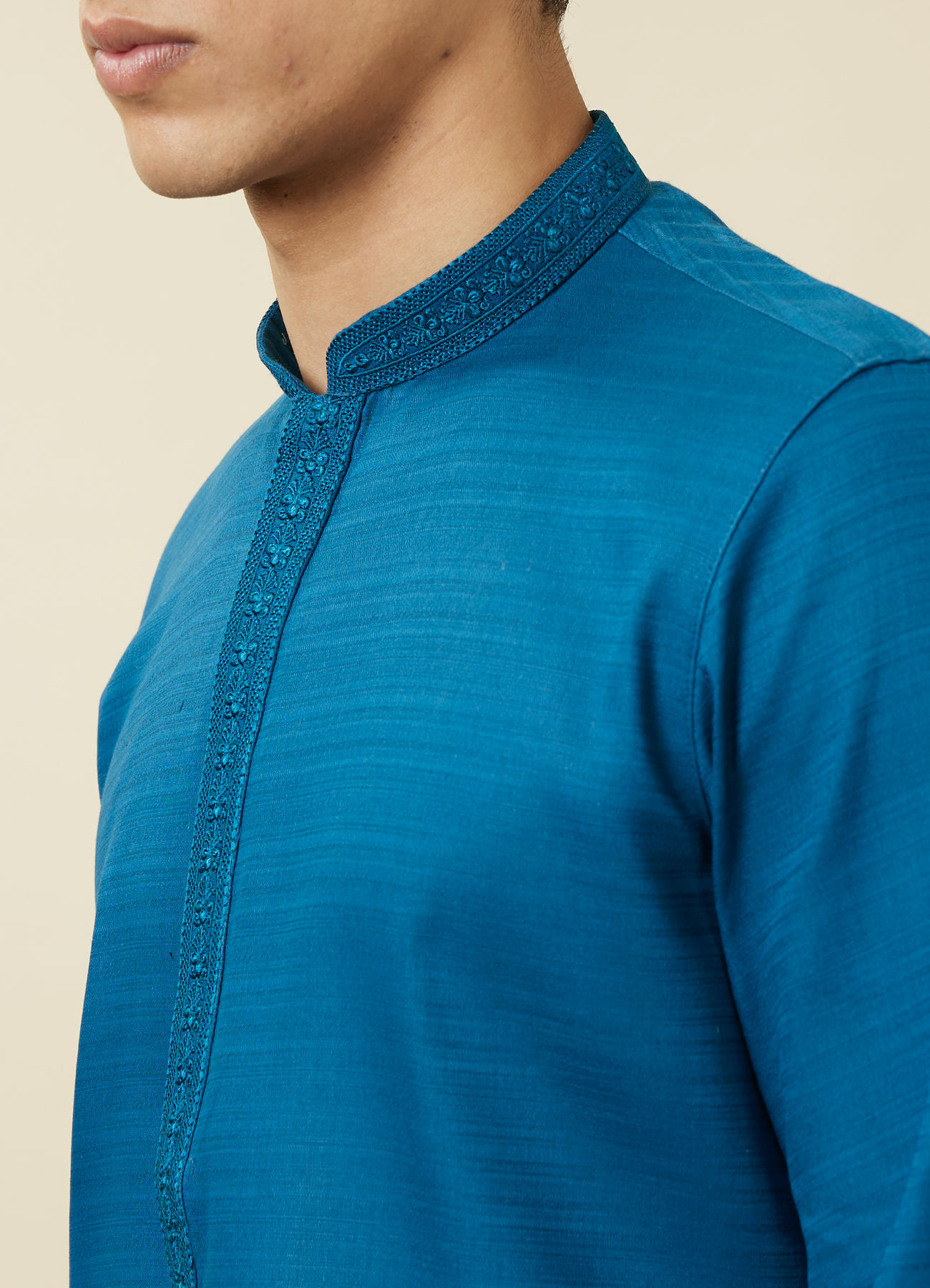 Manyavar Men Brilliant Blue Embroidered Neckline Kurta Set