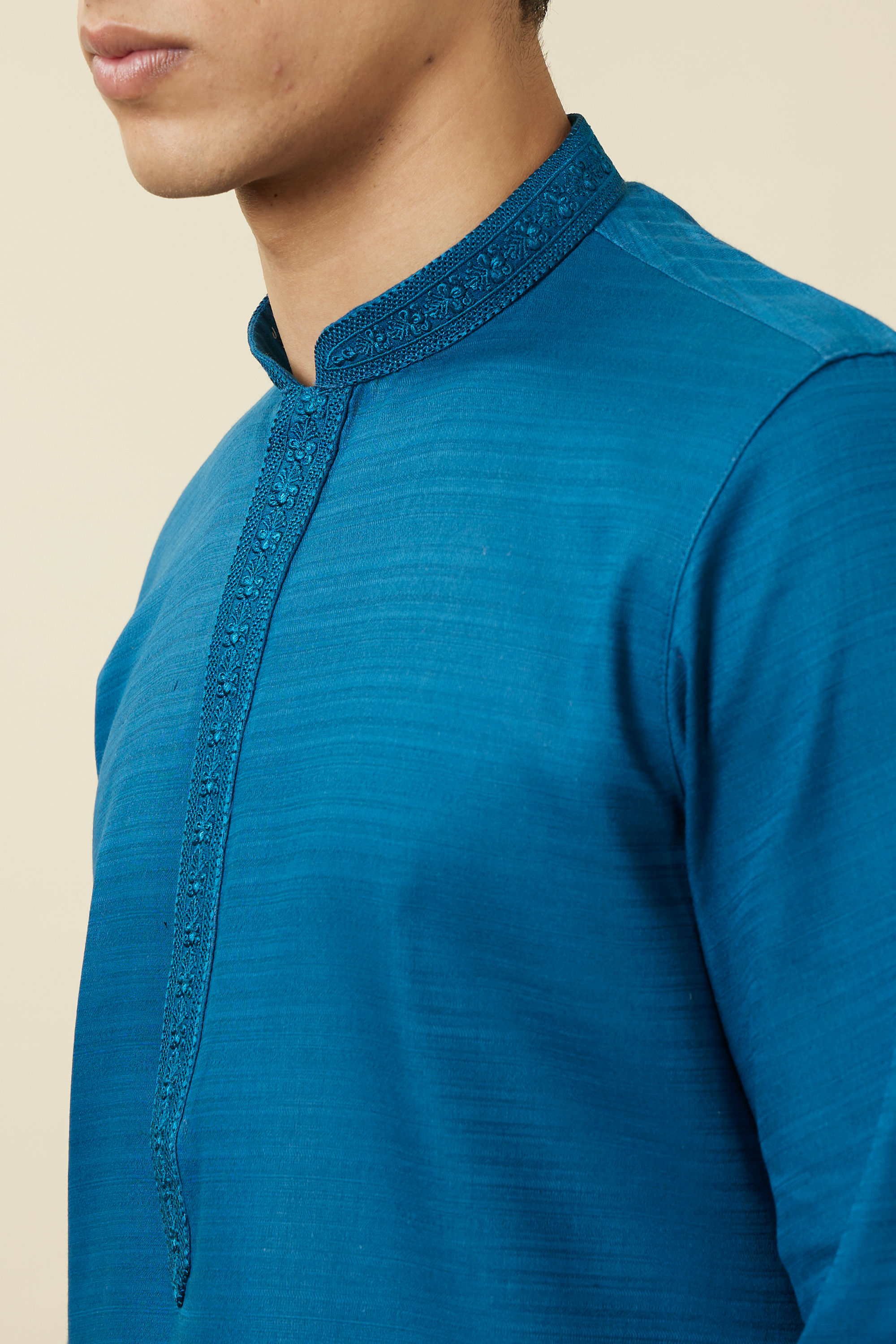 Manyavar Men Brilliant Blue Embroidered Neckline Kurta Set