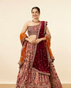 alt message - Mohey Women Orange Maroon Embroidered Bridal Lehenga image number 0