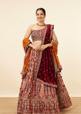 alt message - Mohey Women Orange Maroon Embroidered Bridal Lehenga image number 0