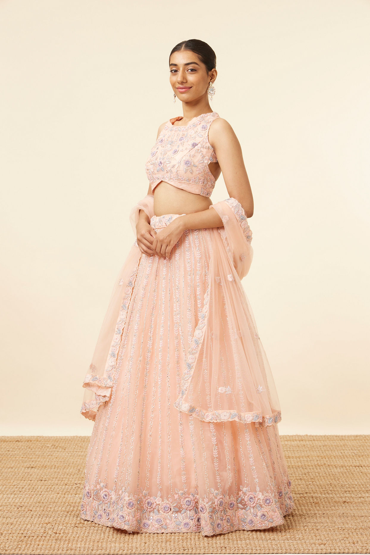 alt message - Mohey Women Peach Pink Net Floral Patterned Lehenga image number 2