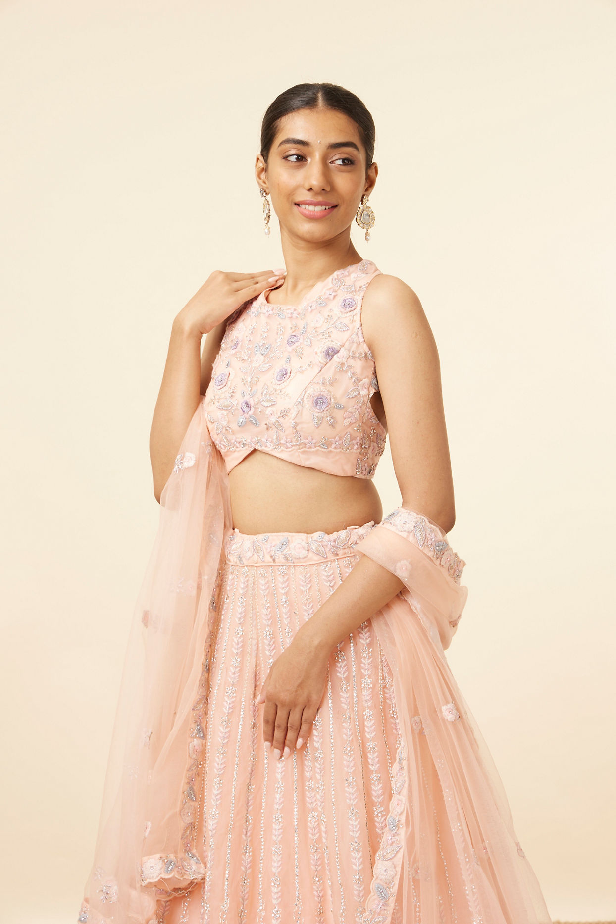 alt message - Mohey Women Peach Pink Net Floral Patterned Lehenga image number 1