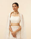 alt message - Mohey Women Light Cream Patterned Lehenga image number 1