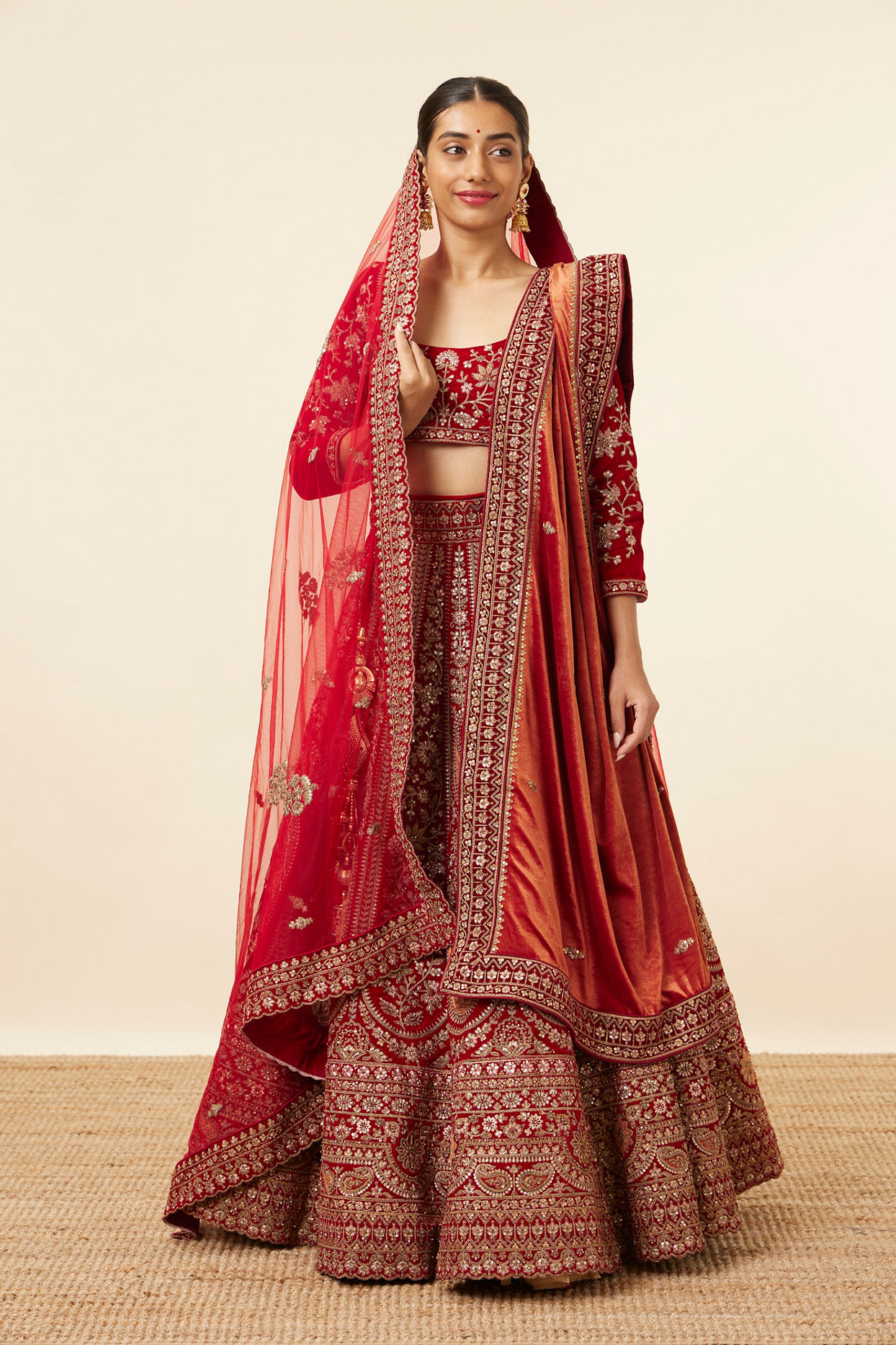 alt message - Mohey Women Berry Red Embroidered Bridal Lehenga image number 0