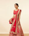 alt message - Mohey Women Red Embellished Bridal Lehenga image number 2