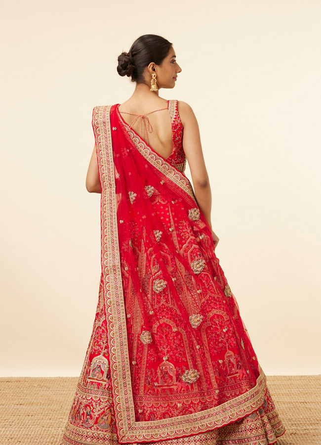 alt message - Mohey Women Red Embellished Bridal Lehenga image number 3