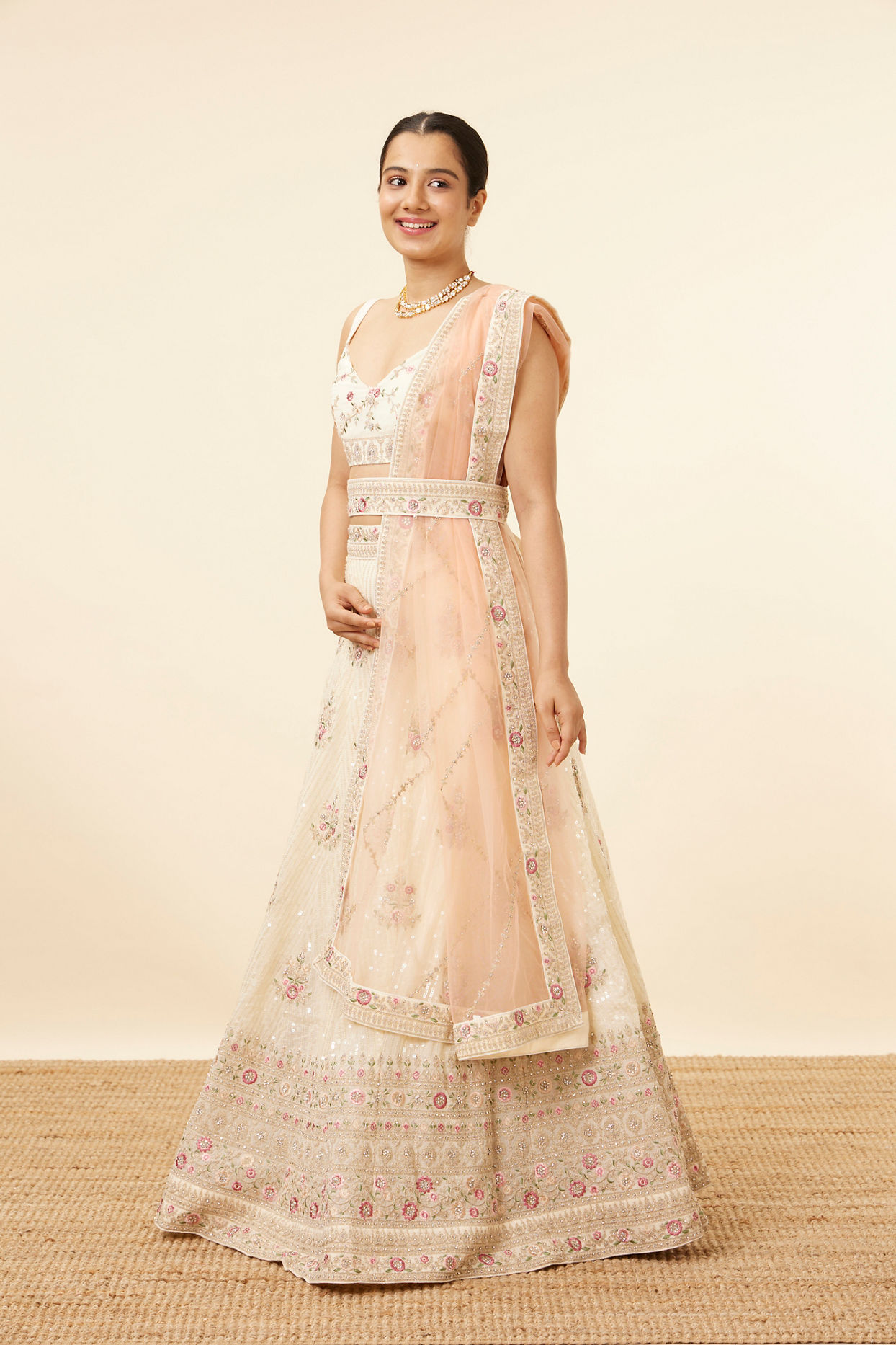 Mohey Women Enchanting Cream Floral Embroidered Lehenga