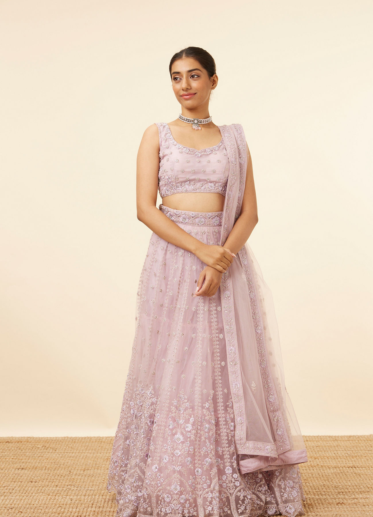 Mohey Women Purple Net Embellished Lehenga