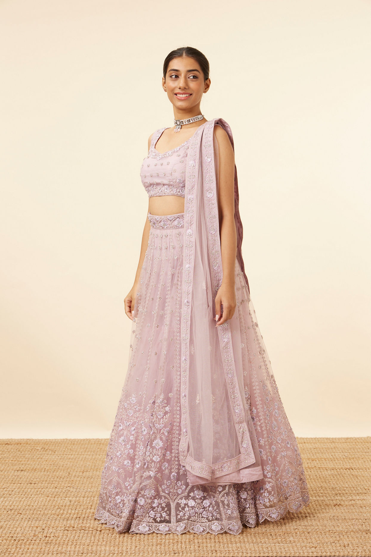 Mohey Women Purple Net Embellished Lehenga
