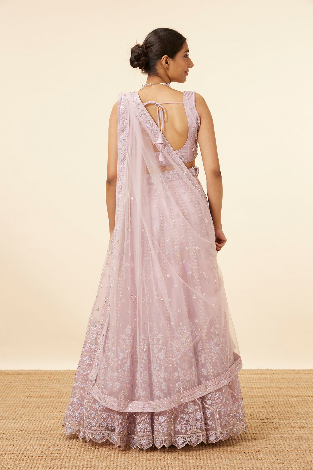Mohey Women Purple Net Embellished Lehenga