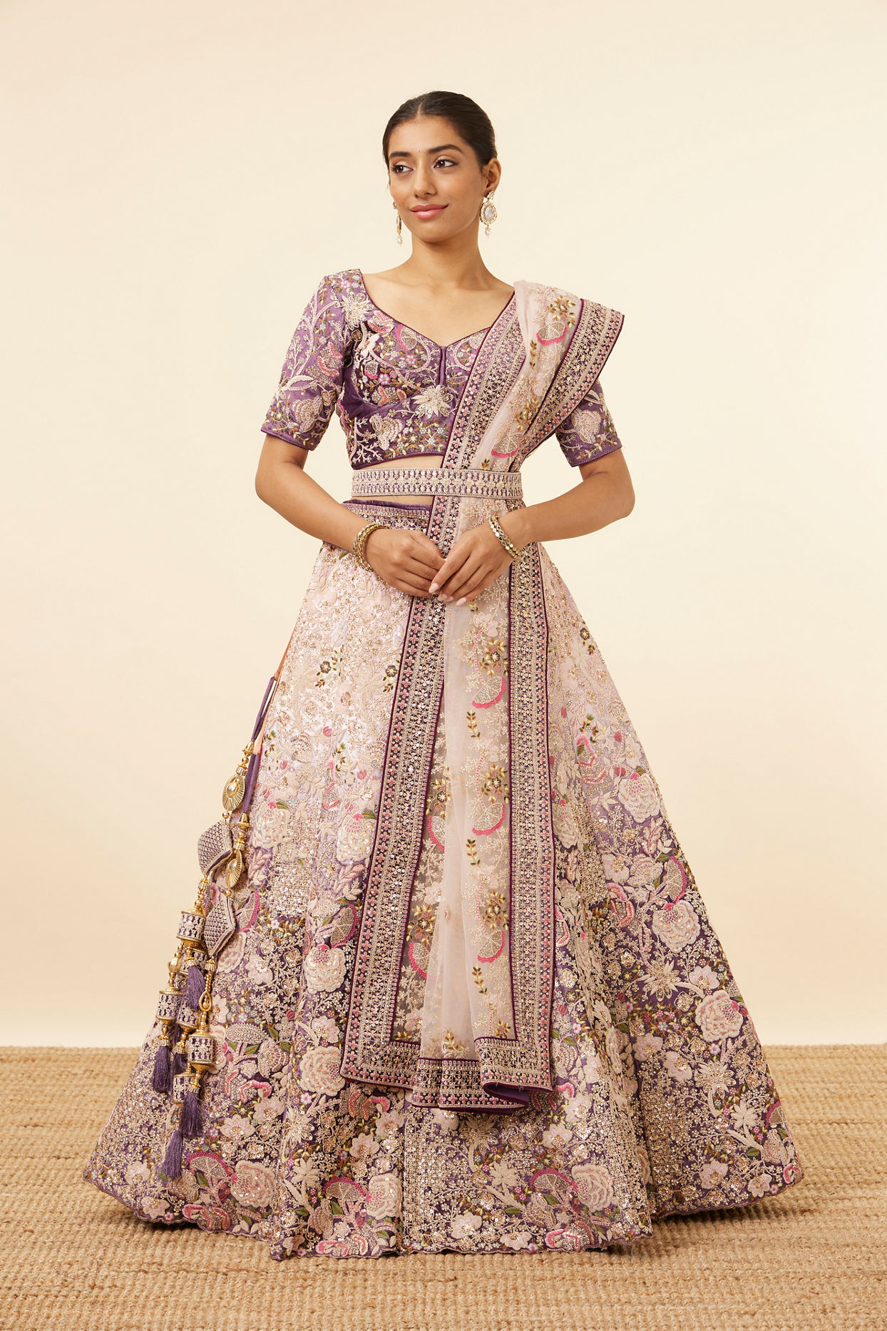 alt message - Mohey Women Light Pink Purple Embroidered Lehenga image number 0