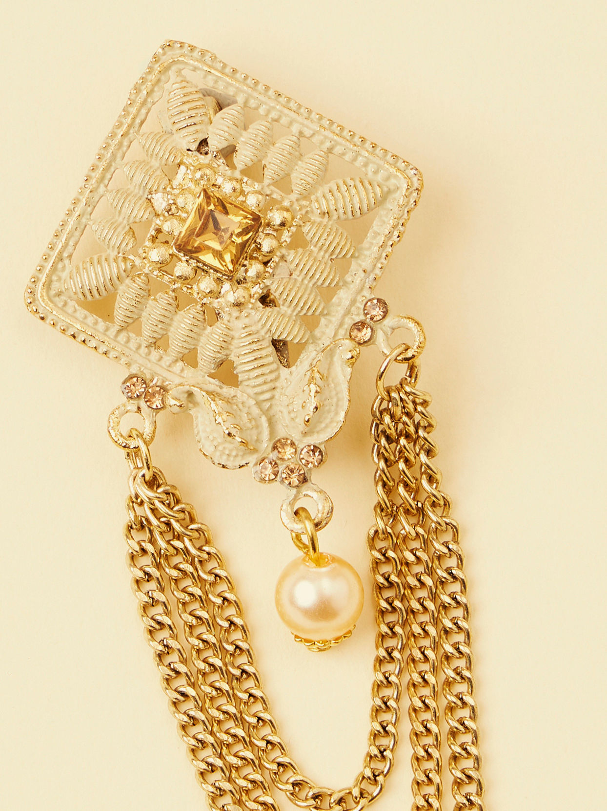 alt message - Manyavar Men Antique White Pearl Adorned Chain Brooch image number 1