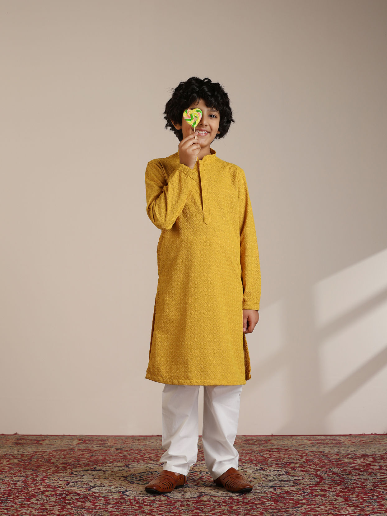 alt message - Manyavar Boys Mustard Cotton Chikankari Thread Work Kurta Set image number 1