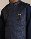 alt message - Manyavar Boys Boys Dark Blue Paisley Patterned Angrakha Jacket Set image number 1