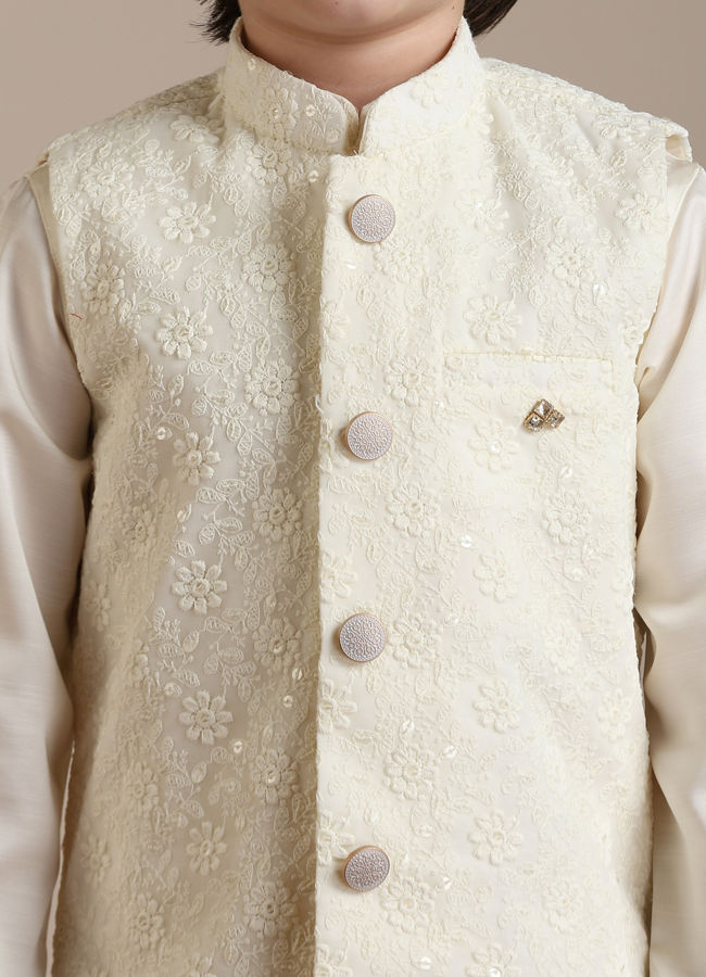 alt message - Manyavar Boys Boys Cream Warm White Self Patterned Jacket Set image number 1