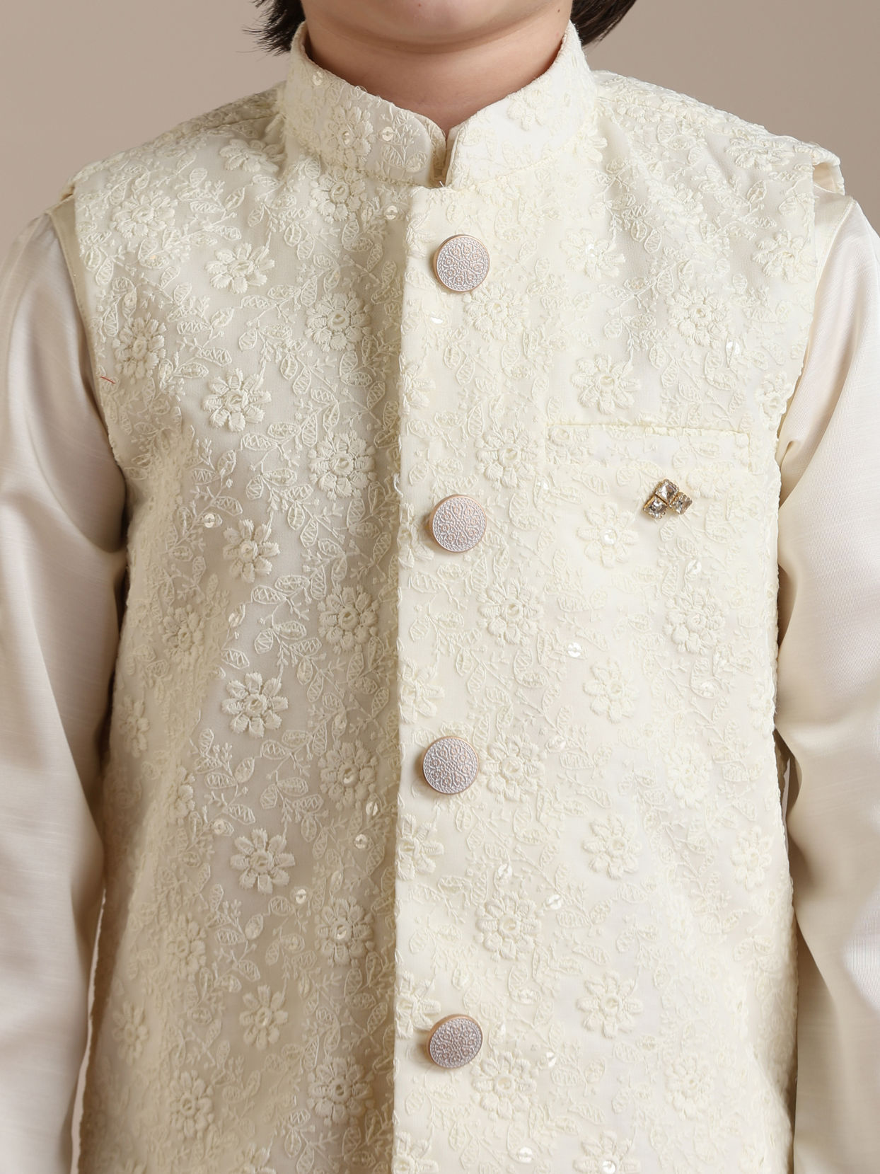 alt message - Manyavar Boys Boys Cream Warm White Self Patterned Jacket Set image number 1