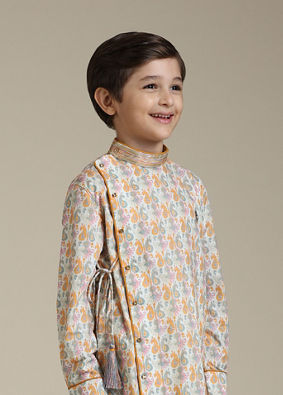 alt message - Manyavar Boys Boys Light Orange Paisley Printed Angrakha Style Kurta Set image number 0