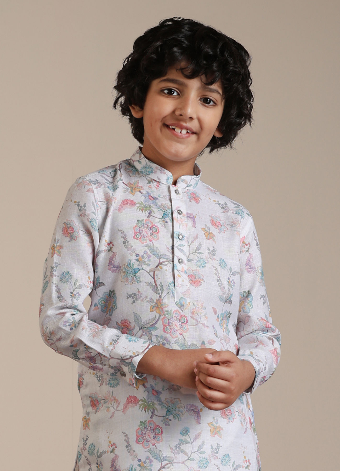 alt message - Manyavar Boys Boys Warm White Floral Printed Kurta Set image number 0