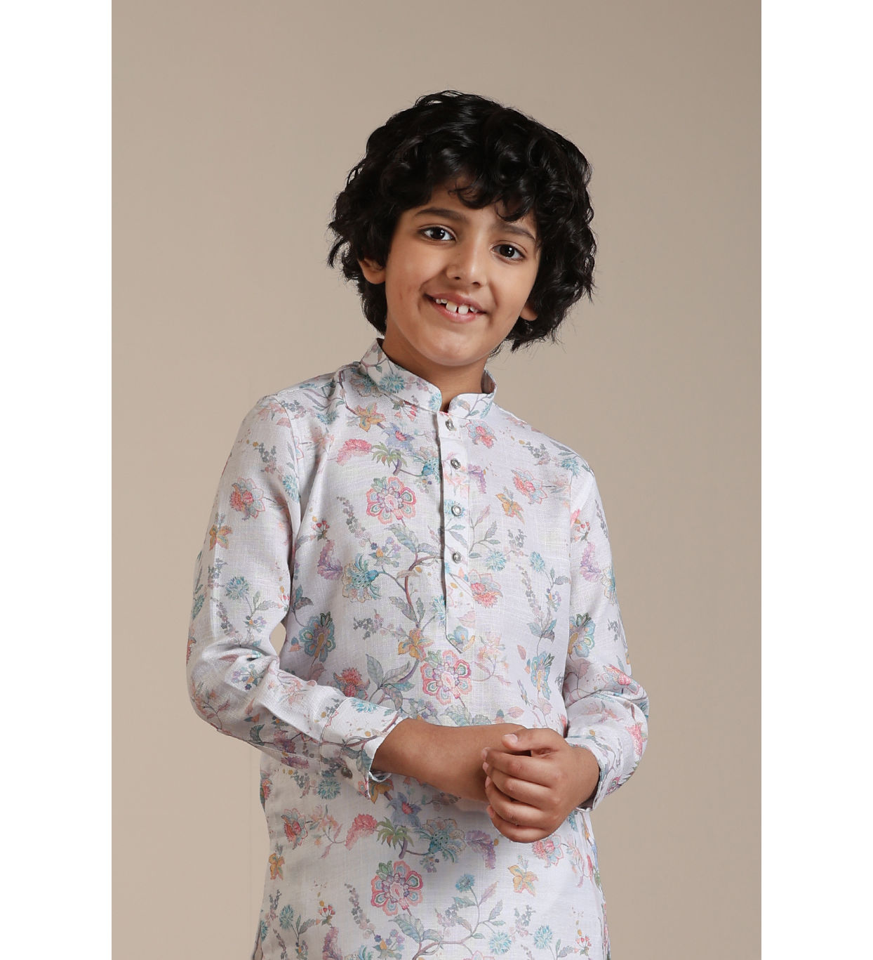 alt message - Manyavar Boys Boys Warm White Floral Printed Kurta Set image number 0