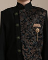 alt message - Manyavar Boys Boys Dark Green Bel Buti Patterned Achkan Style Indo-Western Set image number 1