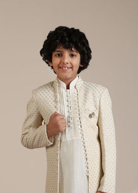 alt message - Manyavar Boys Boys Cream Self Patterned Indo-Western Set with Mirror work image number 0