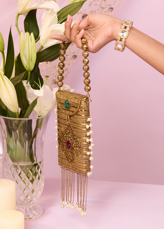 Mohey Women Gleaming Gold Pouch Bag