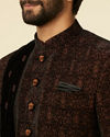 alt message - Manyavar Men Enchanting Black Embroidered Self Texture Indo Western Set image number 1