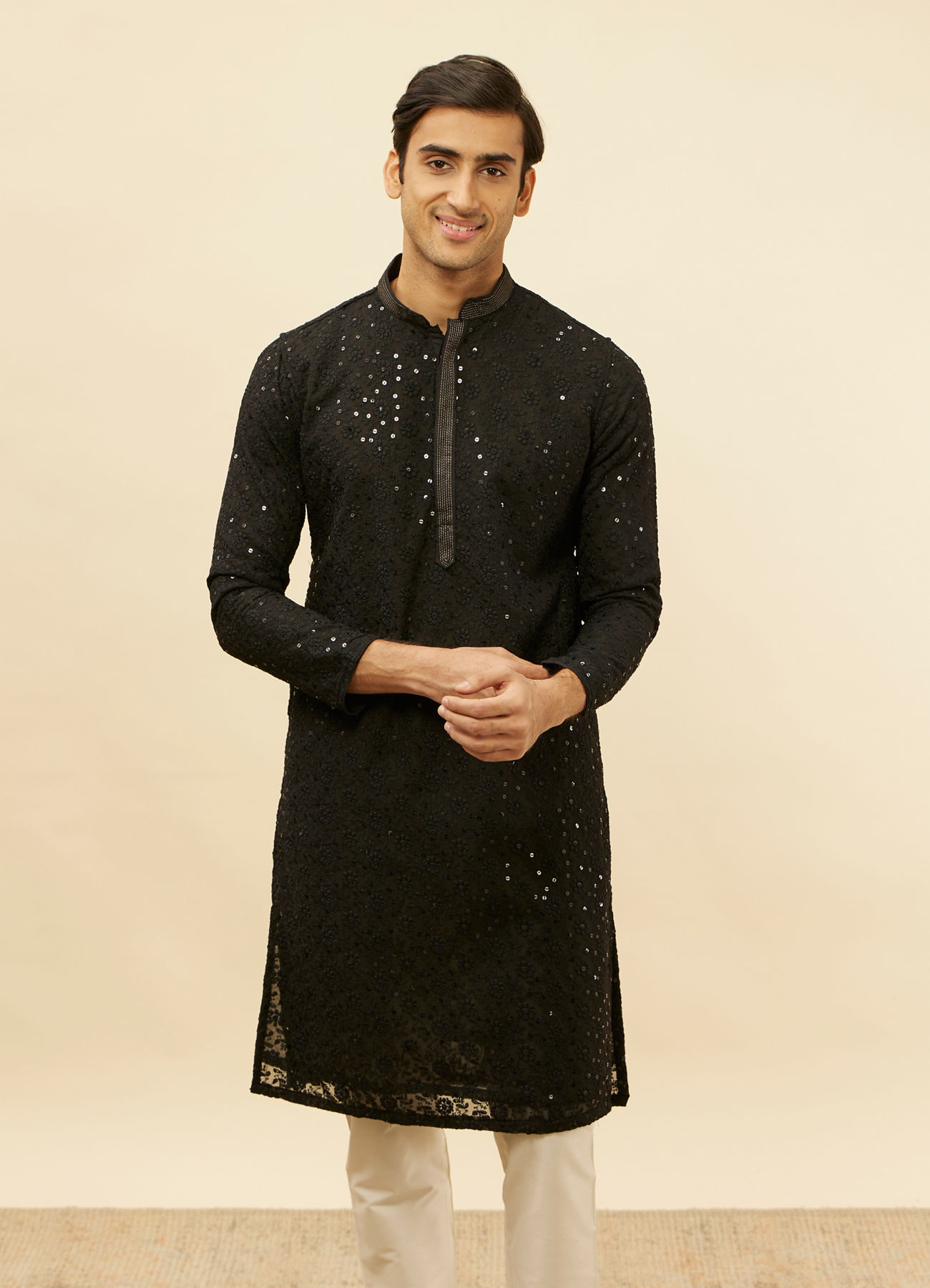 alt message - Manyavar Men Jet Black Chikankari Sequinned Kurta Set image number 0