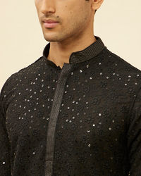 alt message - Manyavar Men Jet Black Chikankari Sequinned Kurta Set image number 1