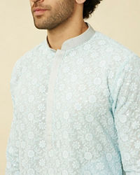 alt message - Manyavar Men Tropical Blue Floral Chikankari Embroidered Kurta Set image number 1