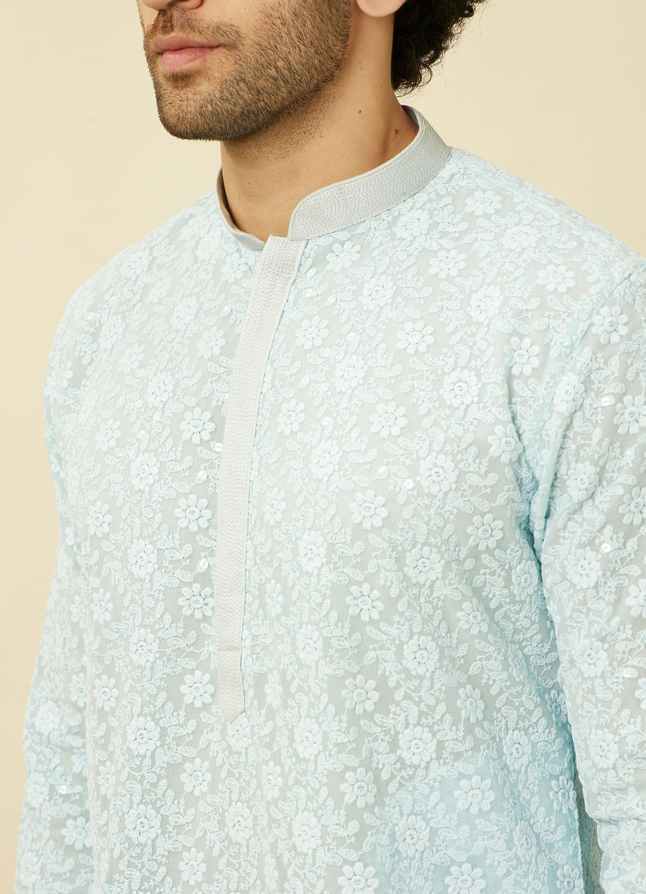 alt message - Manyavar Men Tropical Blue Floral Chikankari Embroidered Kurta Set image number 1