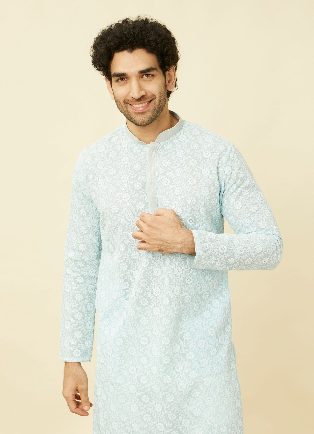 alt message - Manyavar Men Tropical Blue Floral Chikankari Embroidered Kurta Set image number 0