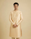 alt message - Manyavar Men Light Cream Embroidered Kurta Set image number 0