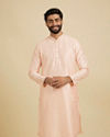 alt message - Manyavar Men Light Pink Sequins Kurta Pajama image number 0