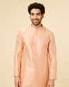 alt message - Manyavar Men Coral Pink Sitara Embellished Kurta Set image number 0