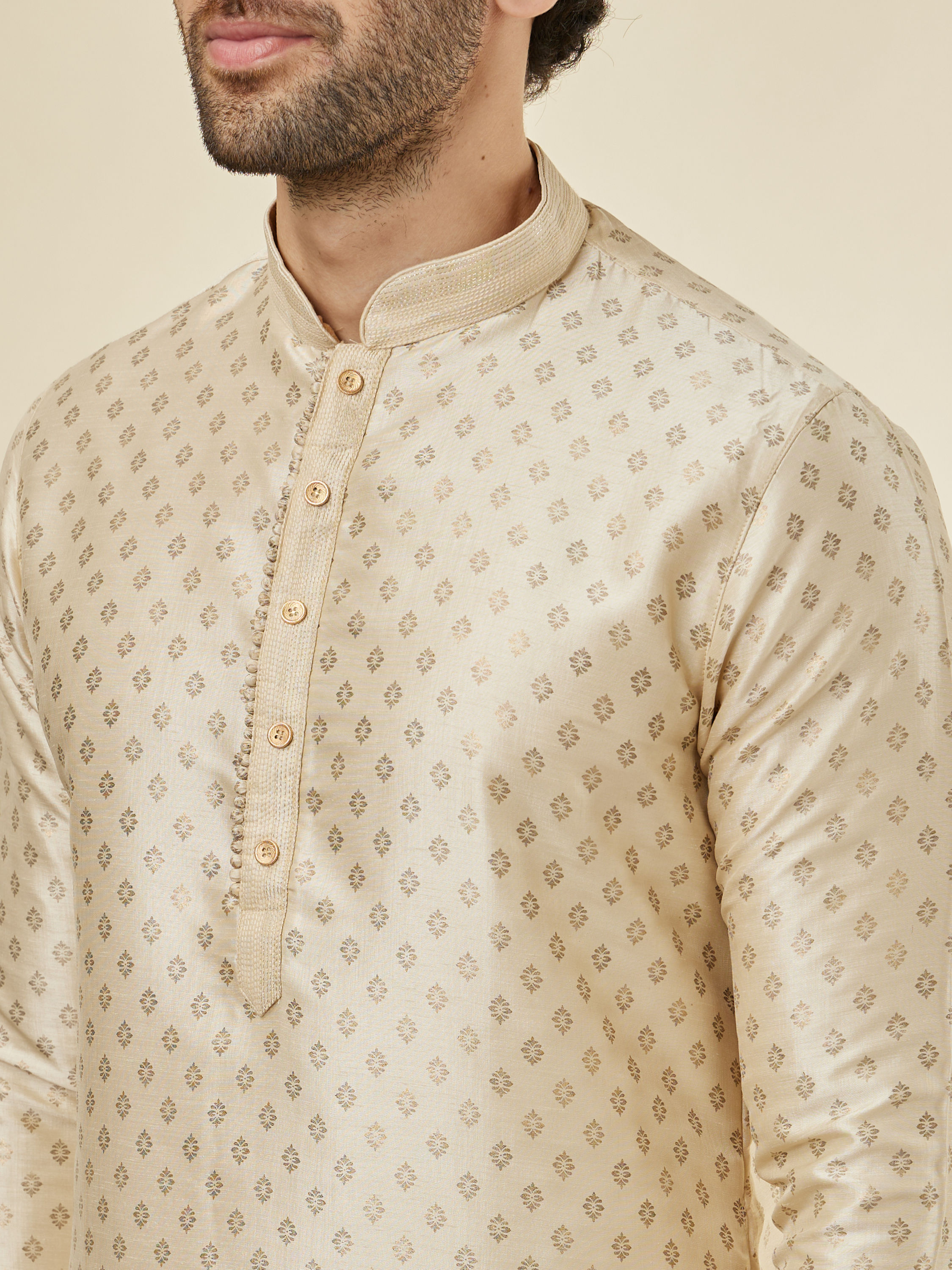 Manyavar Men Biscuit Cream Shankh Patterned Kurta Set