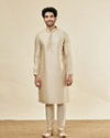 alt message - Manyavar Men Biscuit Cream Shankh Patterned Kurta Set image number 2