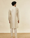 alt message - Manyavar Men Biscuit Cream Shankh Patterned Kurta Set image number 5