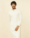 alt message - Manyavar Men Soft Cream Chikankari Kurta Set image number 0