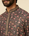 alt message - Manyavar Men Kohl Black Bel Butti Patterned Kurta Set image number 1