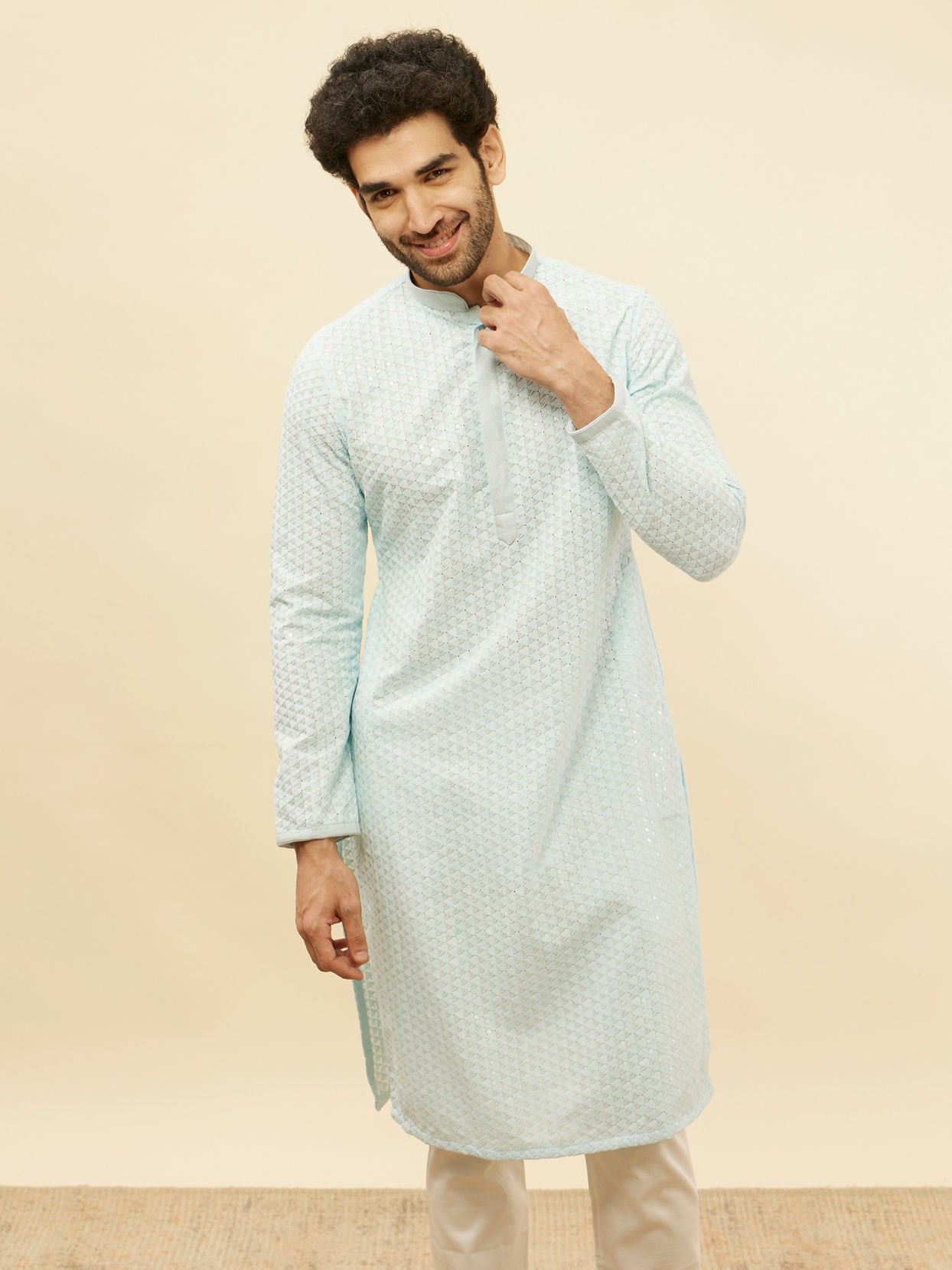 alt message - Manyavar Men Powder Blue Chikankari Sequinned Kurta Set image number 0