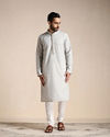 alt message - Manyavar Men Pale Pink and Pista Green Patterned Kurta Set image number 1