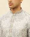 alt message - Manyavar Men Cloud Grey Abstract Print Foil Work Kurta Set image number 1