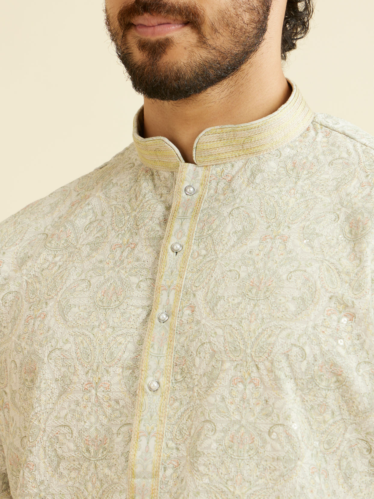 alt message - Manyavar Men Soft Green Chikankari Inspired Floral Buta Print Kurta Set image number 1