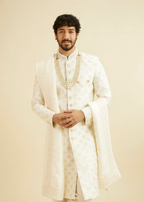 alt message - Manyavar Men Warm White Floral Self Patterned Sherwani Set image number 0