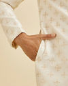 Manyavar Men Warm White Floral Self Patterned Sherwani Set